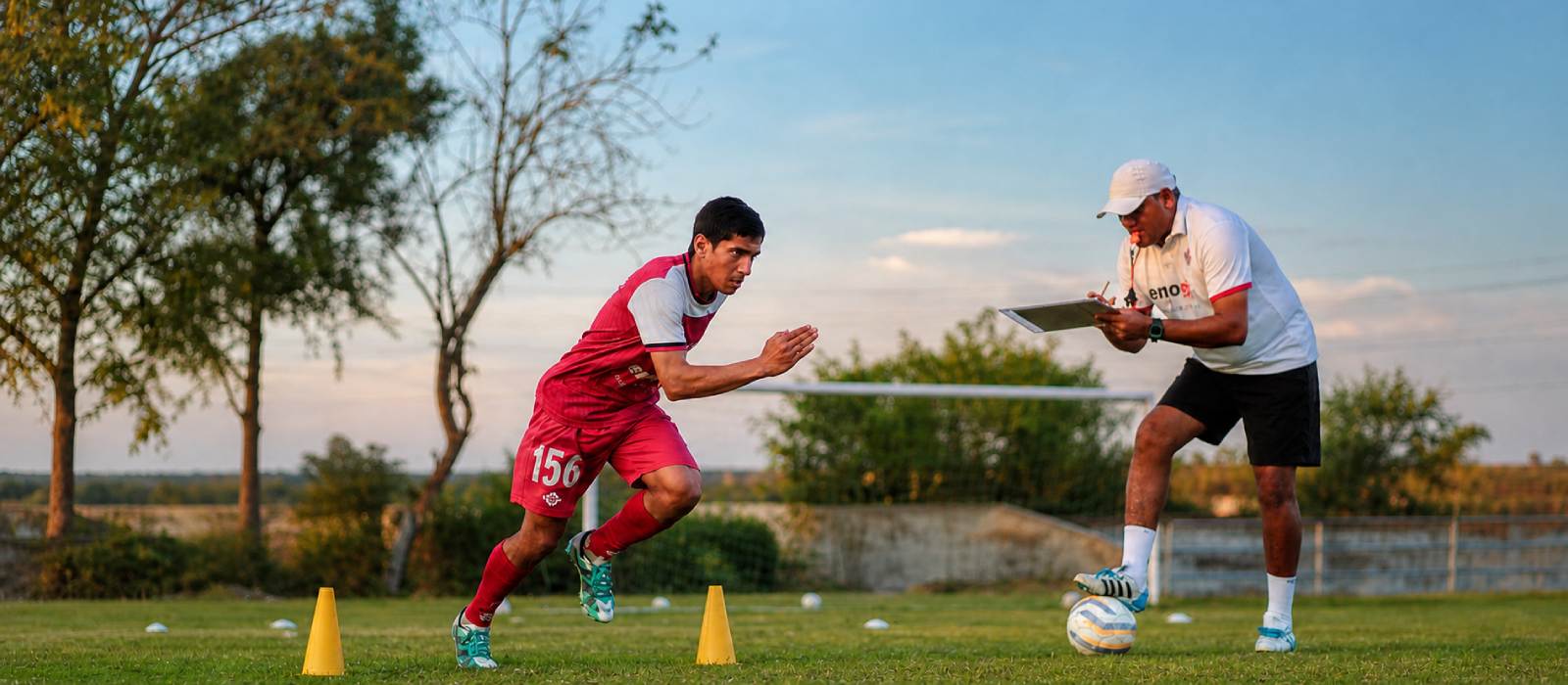 BBFS coach assessing a player during a structured acceleration drill