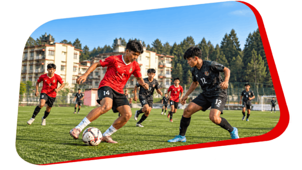 Residential school student dribbling past a defender